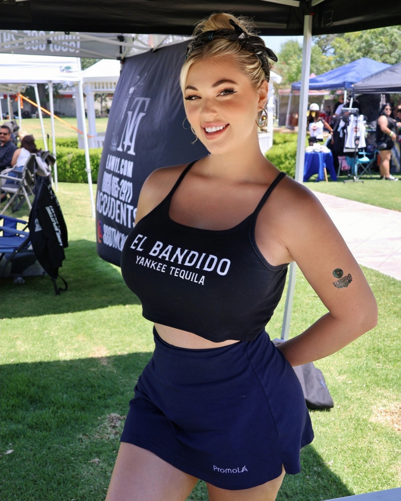 Brand ambassador in El Bandido Yankee Tequila attire at an outdoor event activation